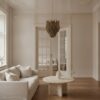 Handblown beige Murano drop chandelier in a Stockholm apartment living room