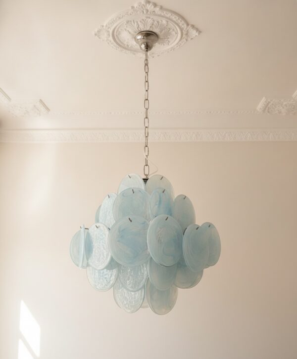 Blue swirled Murano glass disc chandelier under an ornate ceiling rose