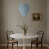Handblown blue Murano drop chandelier over a dining table
