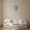 Handblown blue Murano drop chandelier in a Stockholm apartment living room
