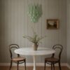 Handblown green Murano drop chandelier over a dining table
