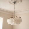 Handblown Murano Alabaster Chandelier – 56 Alabaster Glass under an ornate ceiling rose