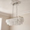 Handblown Murano Alabaster Chandelier – 84 Alabaster Glass under an ornate ceiling rose