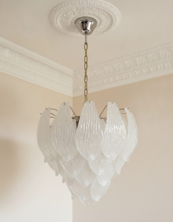 Handblown Murano Carved Chandelier – Medium under an ornate ceiling rose