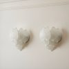 Handblown Murano Carved Wall Sconce – Set of 2 under an ornate ceiling rose