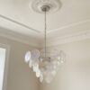 Handblown Murano Disks Chandelier – 57 Glass Discs under an ornate ceiling rose