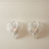 Handblown Murano Fiammette Wall Sconce – Set of 2 under an ornate ceiling rose