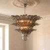 Handblown Murano Palmette Chandelier – 104 Palmette Glass under an ornate ceiling rose