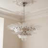 Handblown Murano Palmette Chandelier – 58 Palmette Glass under an ornate ceiling rose