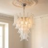 Handblown Murano Petal Chandelier – 52 Glass Petals under an ornate ceiling rose