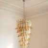 Handblown Murano Petal Chandelier – 83 Glass Petals under an ornate ceiling rose