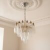 Handblown Murano Poliedri Chandelier – 32 Poliedri Glass under an ornate ceiling rose