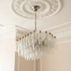 Handblown Murano Poliedri Chandelier – 56 Poliedri Glass under an ornate ceiling rose