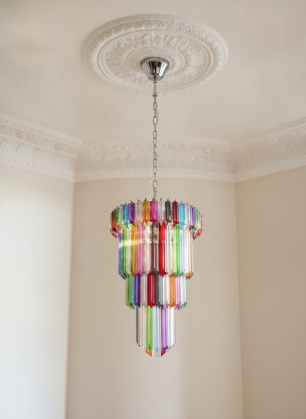 Handblown Murano Quadriedri Chandelier – 111 Quadriedri Glass under an ornate ceiling rose