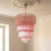 Handblown Murano Quadriedri Chandelier – 112 Quadriedri Glass under an ornate ceiling rose