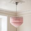 Handblown Murano Quadriedri Chandelier – 163 Quadriedri Glass under an ornate ceiling rose