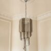 Handblown Murano Quadriedri Chandelier – 54 Quadriedri Glass under an ornate ceiling rose
