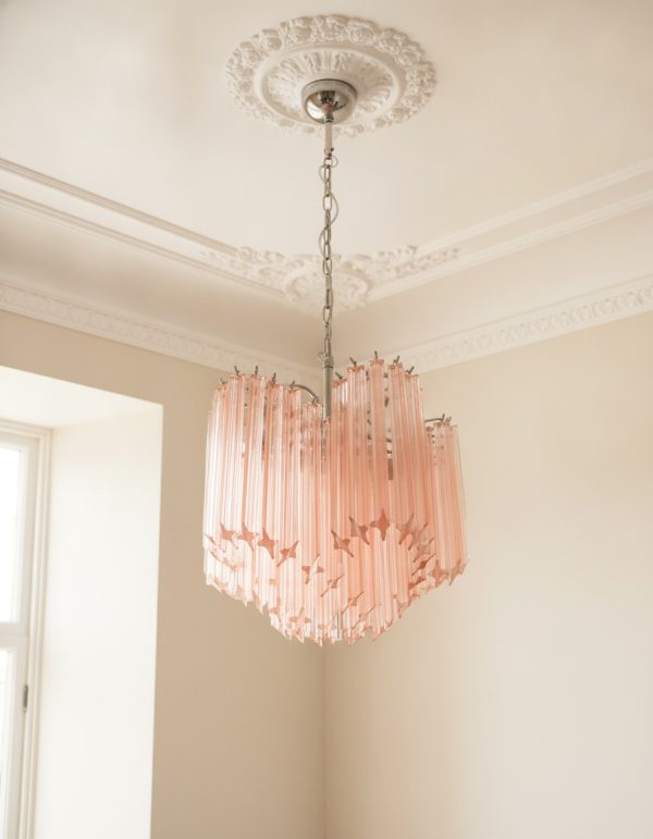 Handblown Murano Quadriedri Chandelier – 60 Quadriedri Glass under an ornate ceiling rose