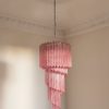 Handblown Murano Quadriedri Chandelier – 86 Quadriedri Glass under an ornate ceiling rose