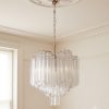 Handblown Murano Triedri Chandelier – 111 Triedri Glass under an ornate ceiling rose