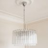Handblown Murano Triedri Chandelier – 163 Triedri Glass under an ornate ceiling rose