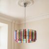 Handblown Murano Triedri Chandelier – 265 Triedri Glass under an ornate ceiling rose
