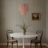 Handblown pink Murano drop chandelier over a dining table