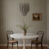 Handblown smoked Murano drop chandelier over a dining table