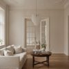 Handblown transparent Murano drop chandelier in a Stockholm apartment living room